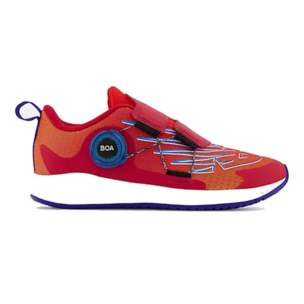 A red New Balance athletic shoe with a blue sole and BOA Performance Fit System.