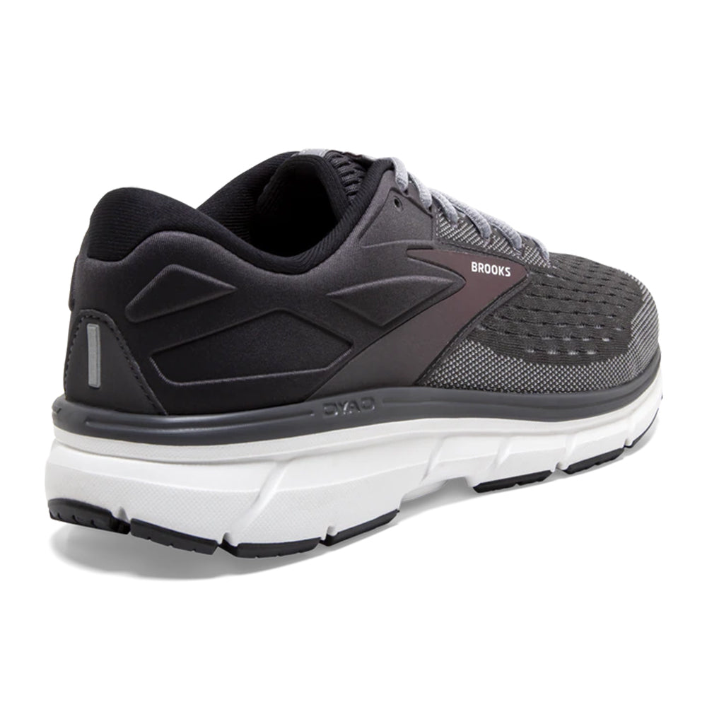 A single black and gray Brooks Dyad 11 running shoe with white sole, designed for cushioning in neutral running.
