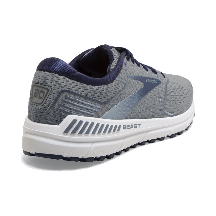 A Brooks Beast 20 Blue/Grey running shoe displayed against a white background, featuring a blue and gray upper with a white sole.