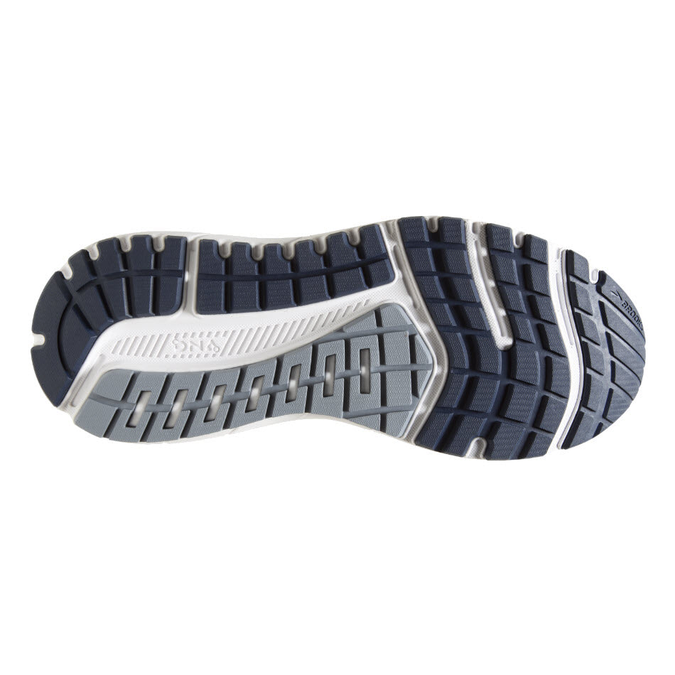 Bottom view of a Brooks BEAST 20 BLUE/GREY - MENS shoe sole featuring a navy blue and gray tread pattern with textured grip designs and branding details.