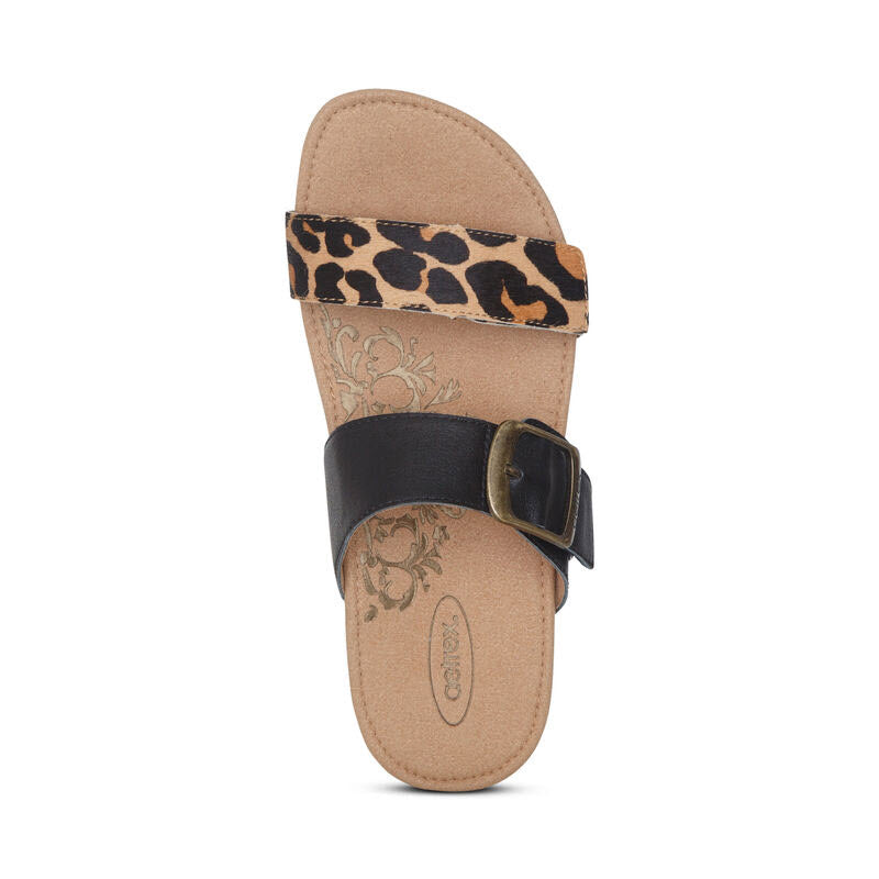 Aetrex Daisy Leopard women&#39;s leather slide sandal with adjustable straps on a white background.