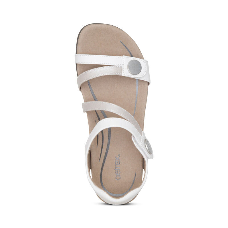 Aetrex Jess White women&#39;s sandal with memory foam footbed on a white background.