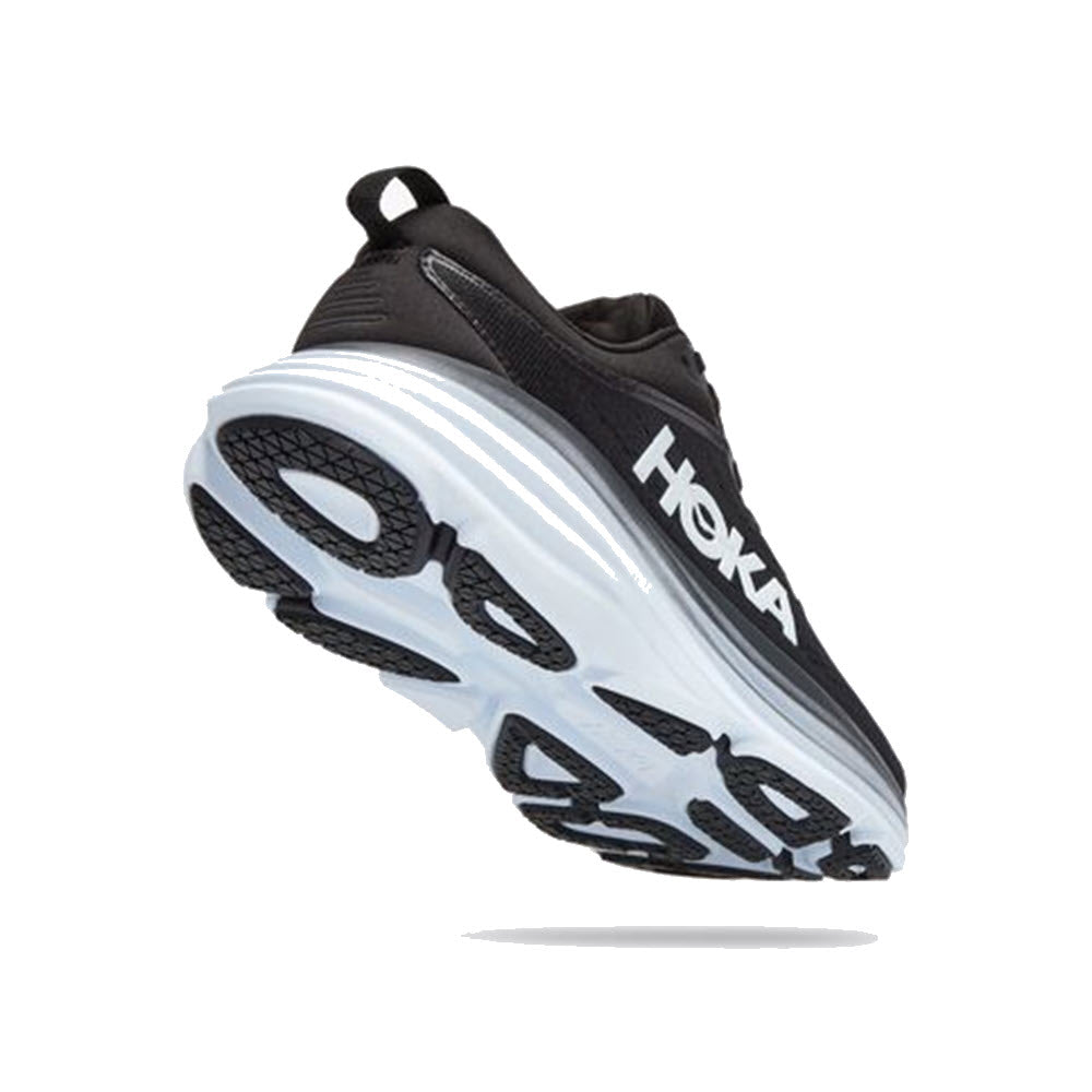 A single HOKA BONDI 8 BLACK/WHITE - WOMENS neutral running shoe with thick sole, displayed against a white background.