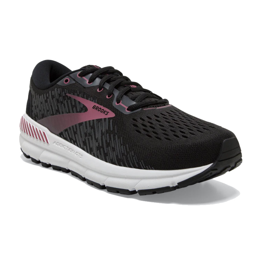 A single black and pink Brooks Addiction GTS 15 women&#39;s running shoe displayed against a white background.