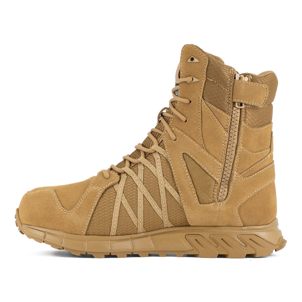 Tan Reebok Work Trailgrip Tactical boot isolated on a white background.