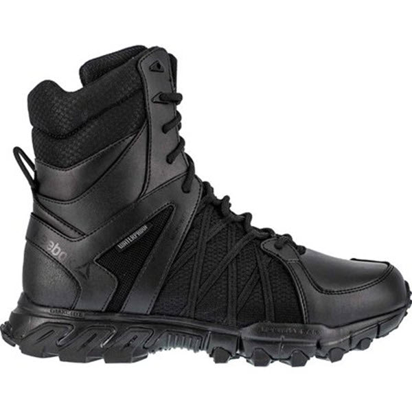 Black high-top REEBOK WORK TRAIL GRIP TACTICAL ZIP BOOT with Thinsulate Insulation and a thick sole.