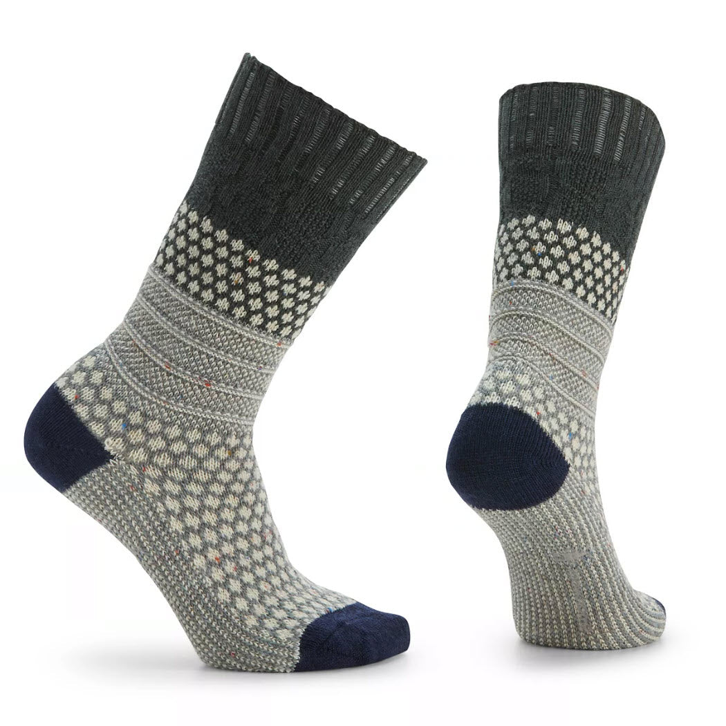 A pair of women&#39;s Smartwool Popcorn Cable Dark Sage Merino Wool socks isolated on a white background.