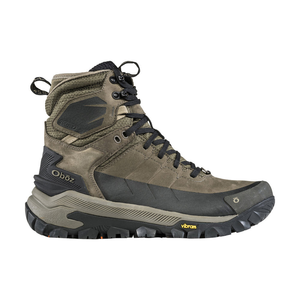 High-top hiking boot featuring a mix of olive green and gray colors, with a rugged Oboz Vibram Arctic Grip sole and reinforced heel area.