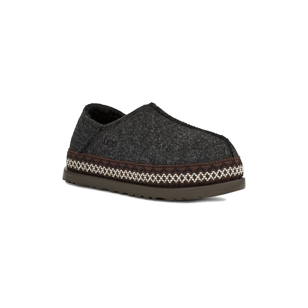 A single UGG REFELT TASMAN BLACK - WOMENS clog with a decorative woven band and a SugarSole™ platform, shown against a white background.