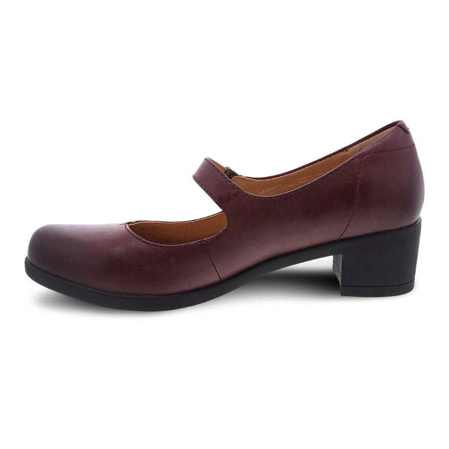 A single wine burnished leather Mary Jane heel with a strap over the instep, set against a white background.