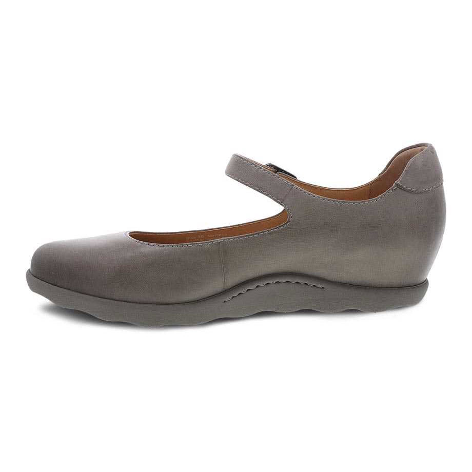Dansko Marcella Taupe Burnished Mary Jane shoe with a hidden wedge heel on a white background.