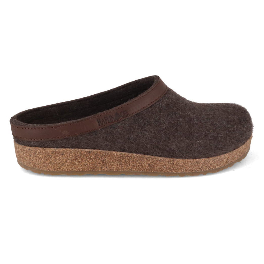 Side view of a single Haflingers GZL Brown - Womens pure wool felt clog with cork sole.