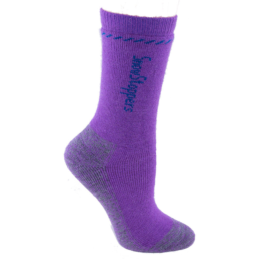 A Snowstoppers purple sock designed for kids, displayed on a mannequin foot, featuring "seamless" text in blue on the ankle.