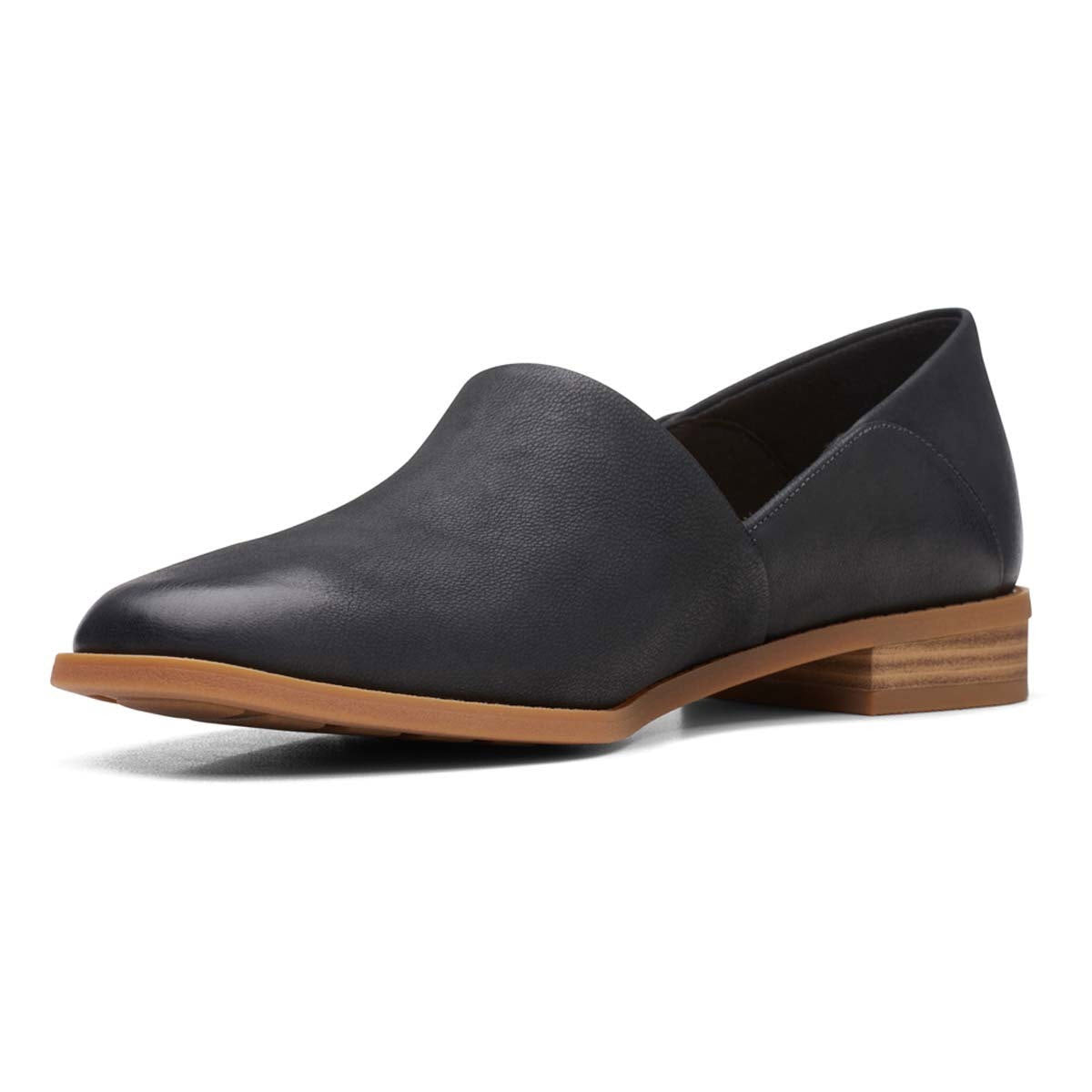 A single Clarks Pure Belle Black loafer with a low wood-effect heel and tan sole, featuring a Contour Cushion footbed, shown against a white background.