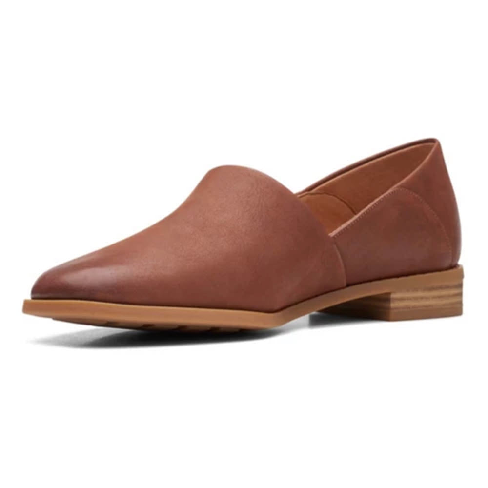 A single Clarks Pure Belle dark tan leather loafer with a low heel and a pointed toe, displayed against a white background.