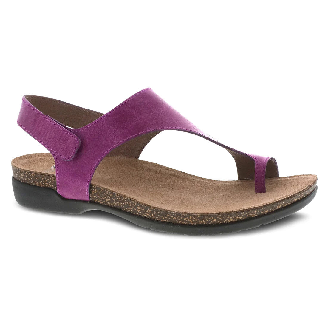 A single Dansko Reece Magenta leather women's sandal with a strap over the toes and an adjustable back strap, set against a white background.