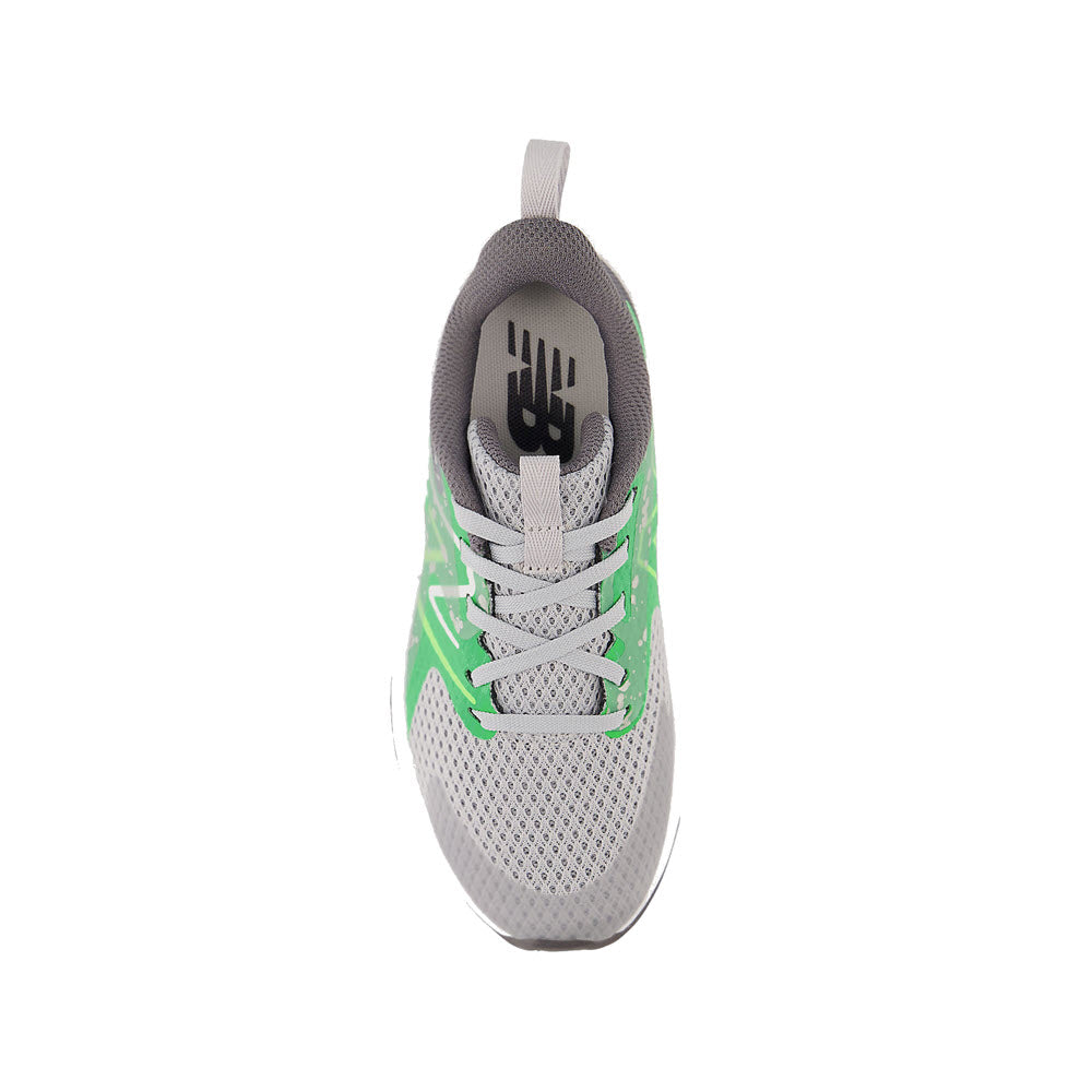Top view of a New Balance Rave Run V2 Raincloud/Green - Kids running shoe with white laces and green accents on a white background.