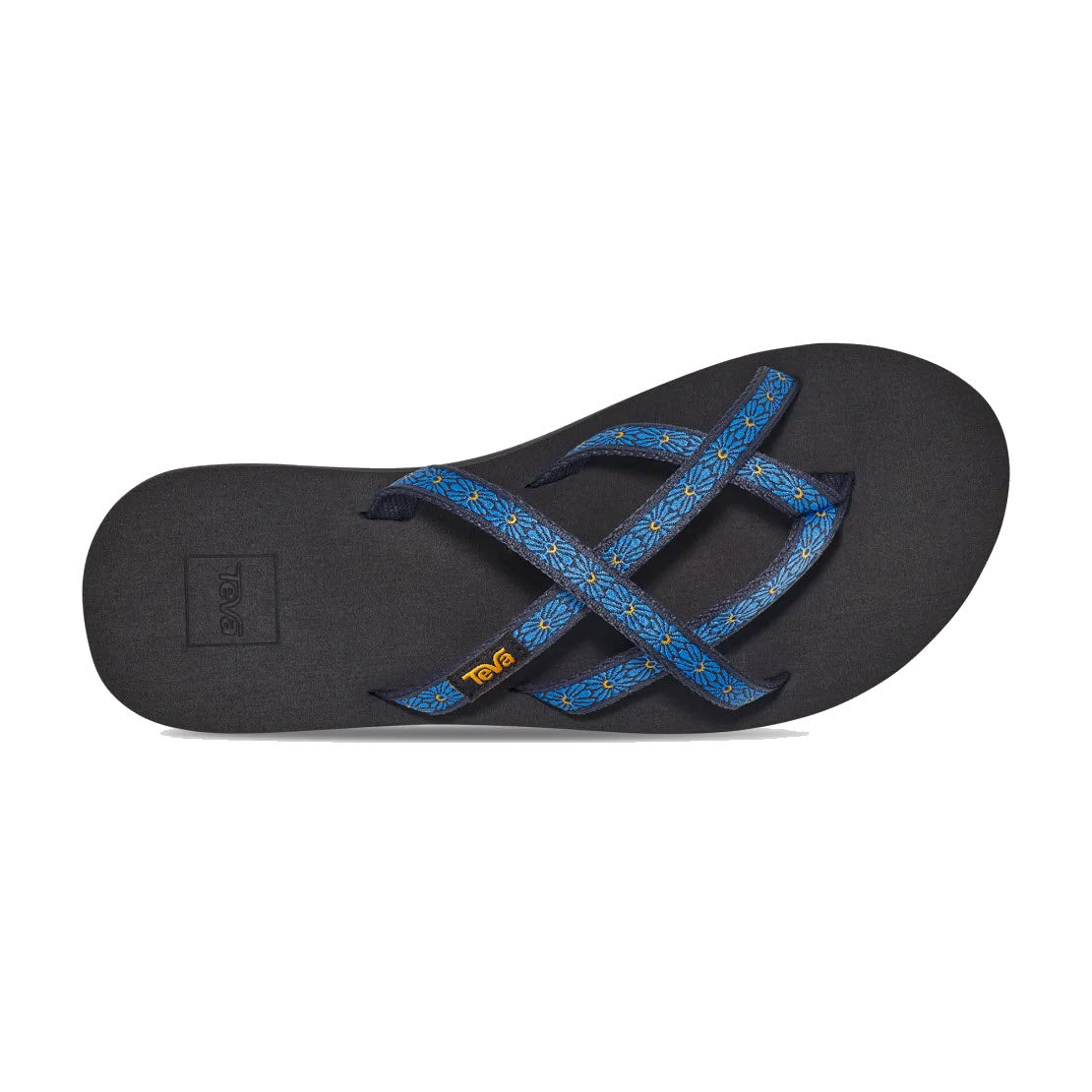 A single TEVA OLOWAHU FLOWER LOOM NAVY sandal with a black sole and blue patterned straps, viewed from above.