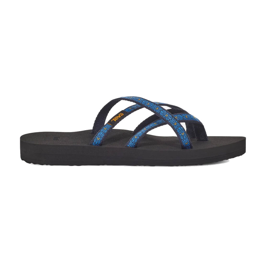 A single black slip-on sandal with blue and yellow patterned straps, Teva Olowahu Flower Loom Navy - Womens.