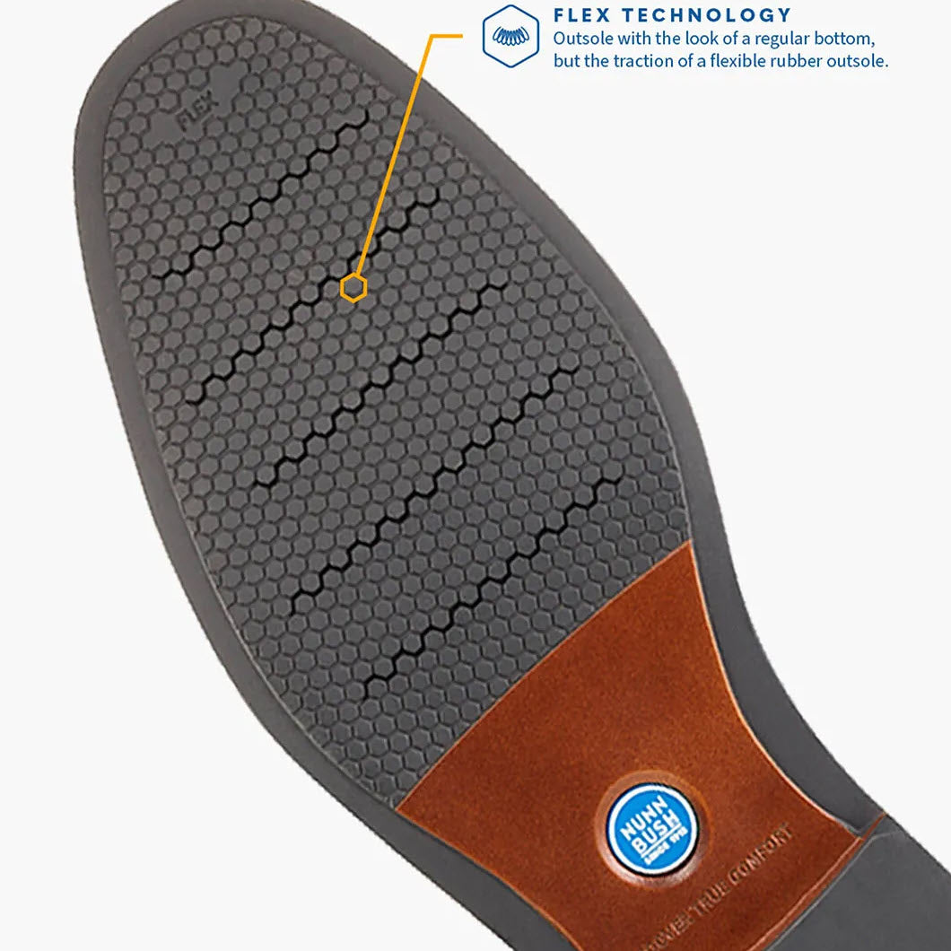 Close-up of a shoe sole with hexagonal tread pattern featuring the Nunn Bush Centro Flex Plain Toe Black - Mens for enhanced traction and flexibility.