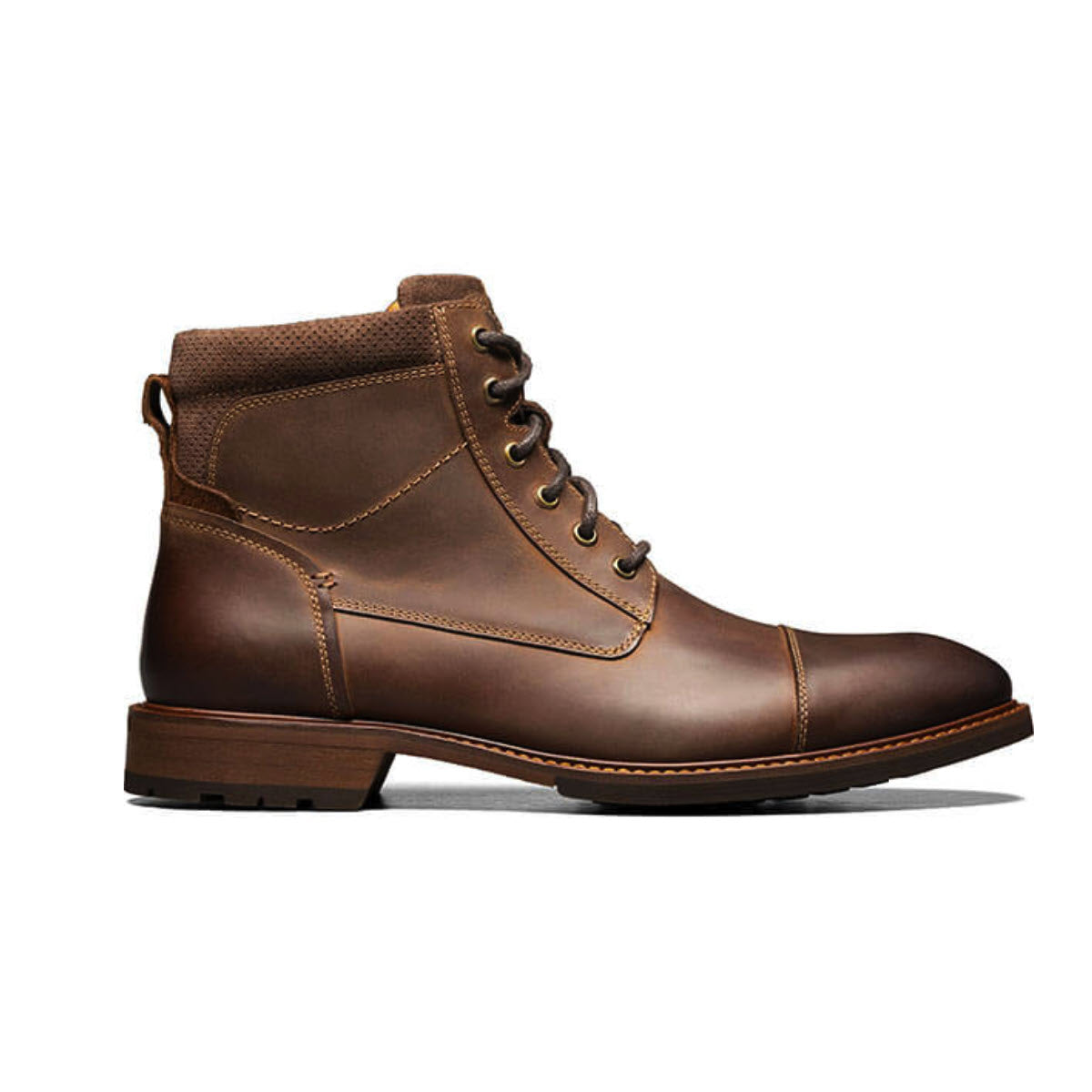 A Florsheim Lodge cap toe lace-up work boot with a low heel, displayed against a plain white background.