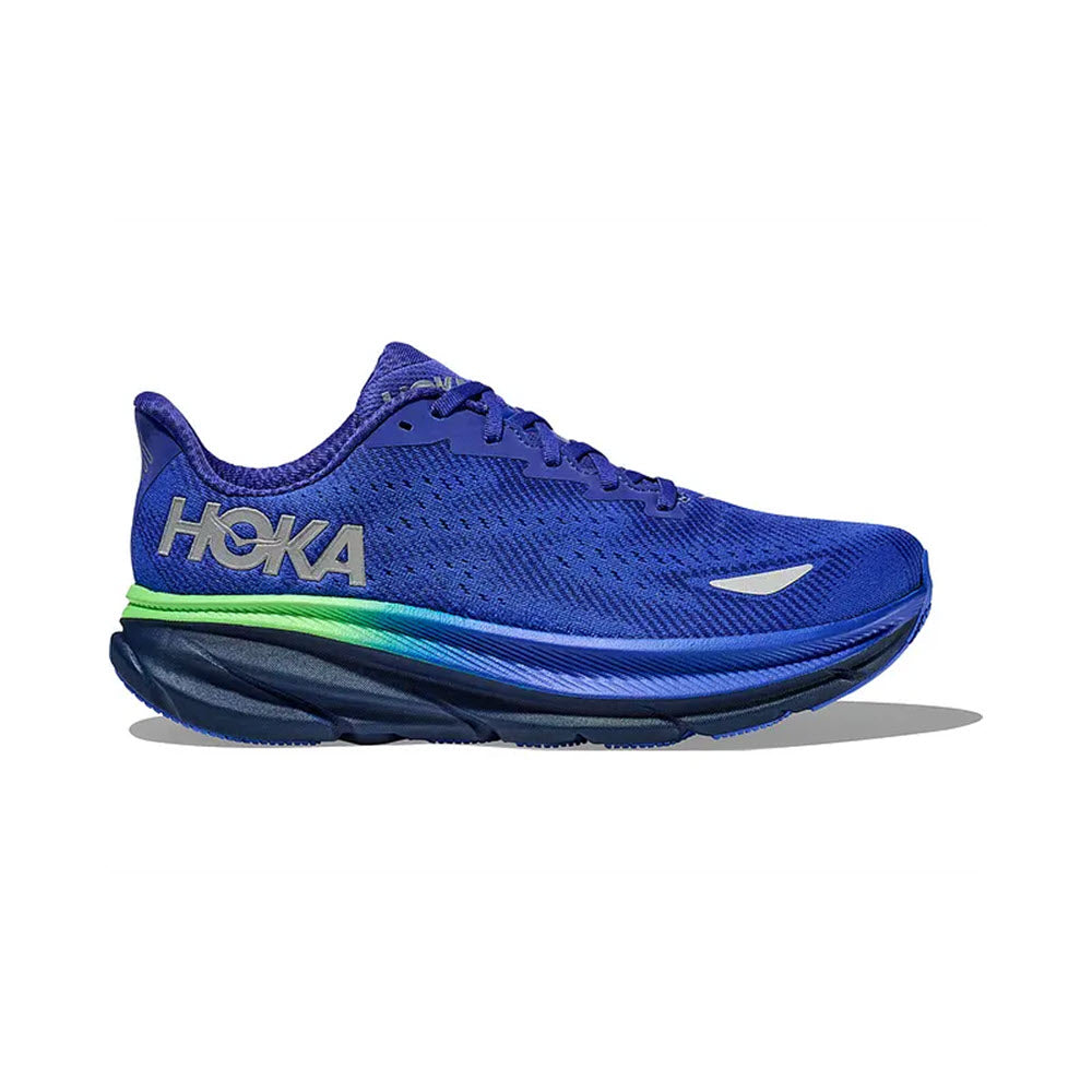 Blue Hoka Clifton 9 GTX running shoe with green and black accents, displaying the Hoka logo and a triangular symbol on the side.