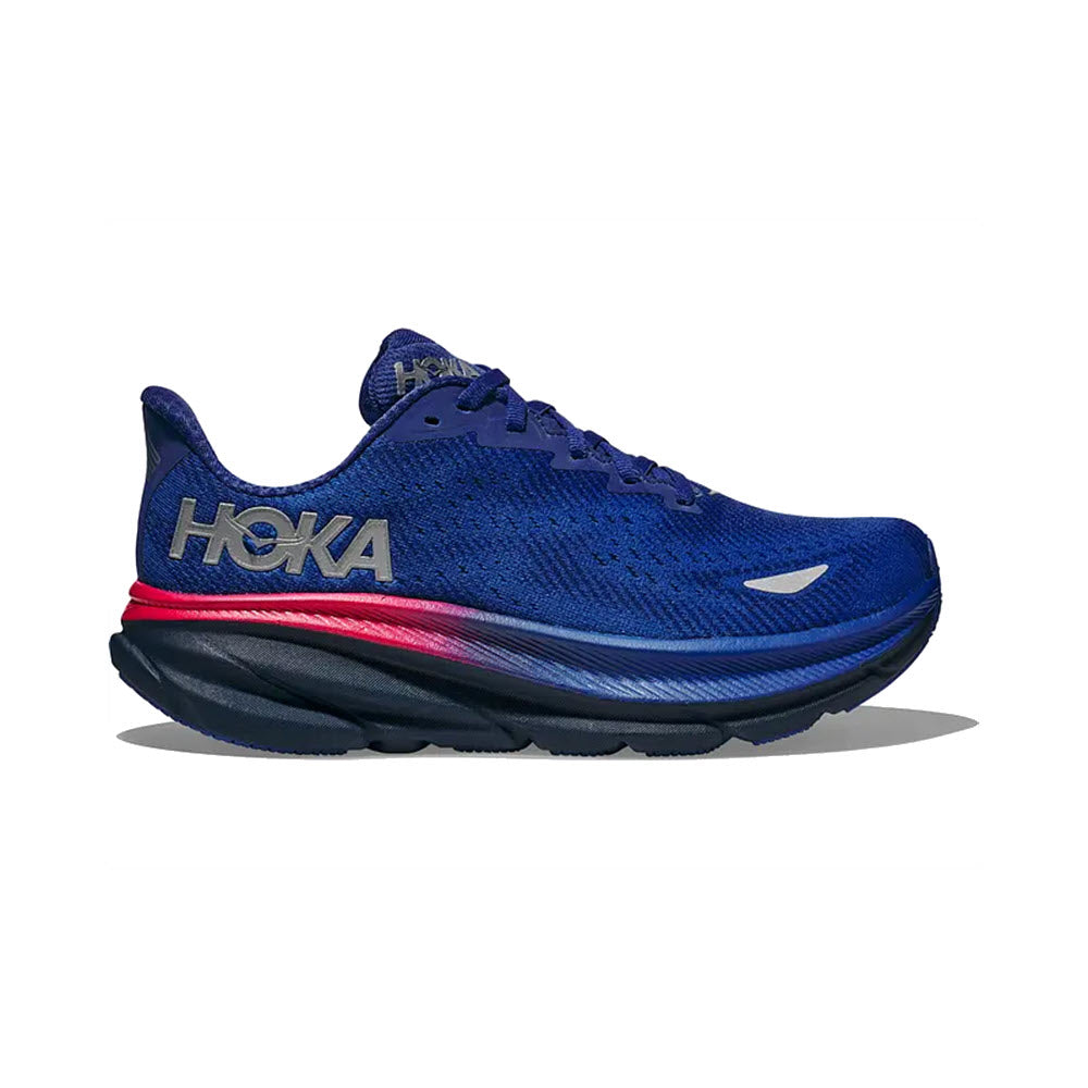Sentence with replaced product:

A blue Hoka Clifton 9 GTX Dazzling Blue/Evening Sky running shoe with a black and pink sole, displaying the brand logo on the side.