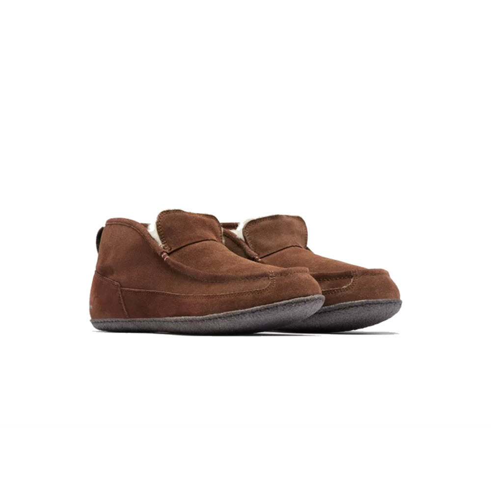 A pair of SOREL MANAWAN II SLIPPER TOBACCO BLACKENED BROWN - MENS slippers with soft lining and rubber outsole, displayed against a white background.