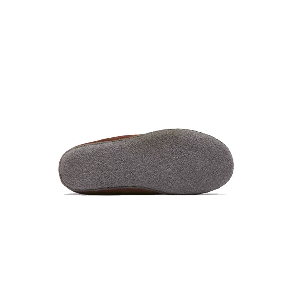 Grey Sorel Manawan II slipper with a brown rubber outsole, viewed from the side, isolated on a white background.