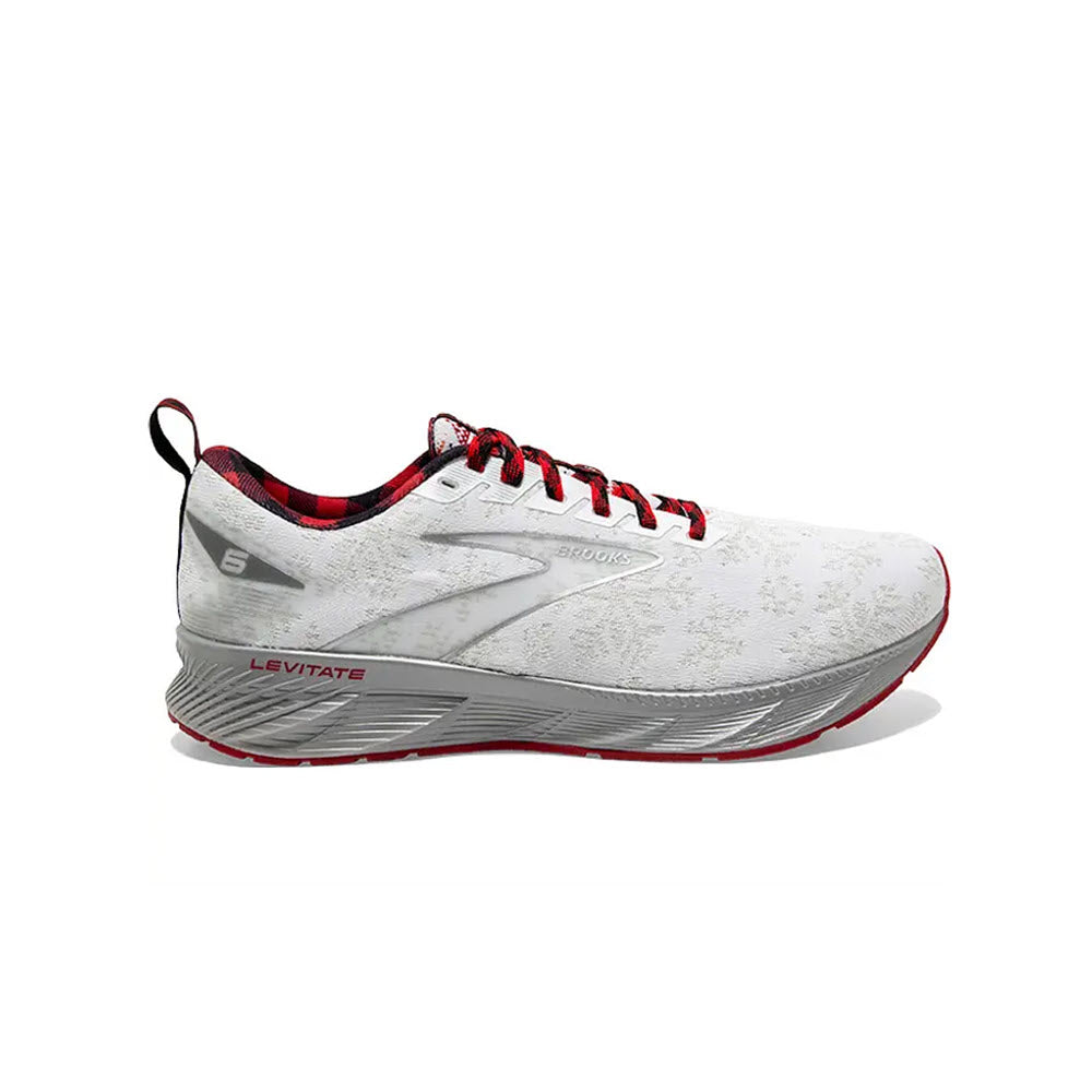 White Brooks Levitate 6 Christmas running shoe with red laces and silver accents, featuring an engineered creel mesh upper on a white background.