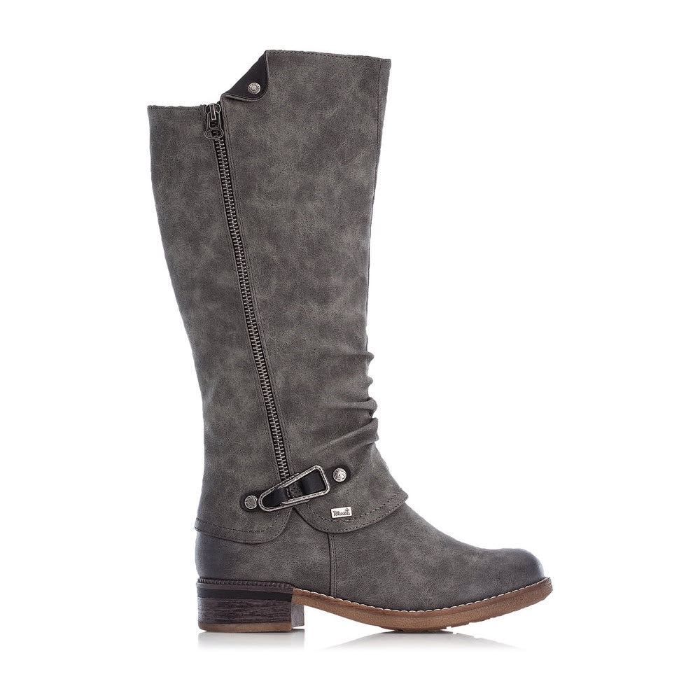 Gray Rieker riding boot with buckle detail, lambswool lining, and a small heel, displayed against a white background.