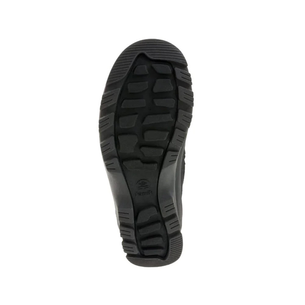 Bottom view of a Kamik shoe sole with a textured tread pattern and waterproof construction, featuring a visible Kamik logo in the center.