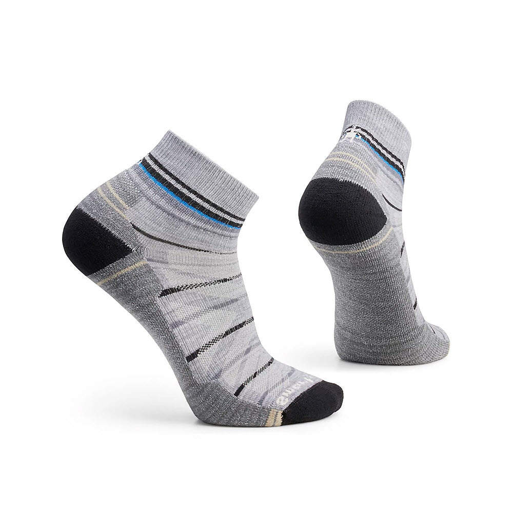 A pair of Smartwool Hike Ankle Socks Pattern Gray - Mens, featuring light cushion and displayed against a white background.