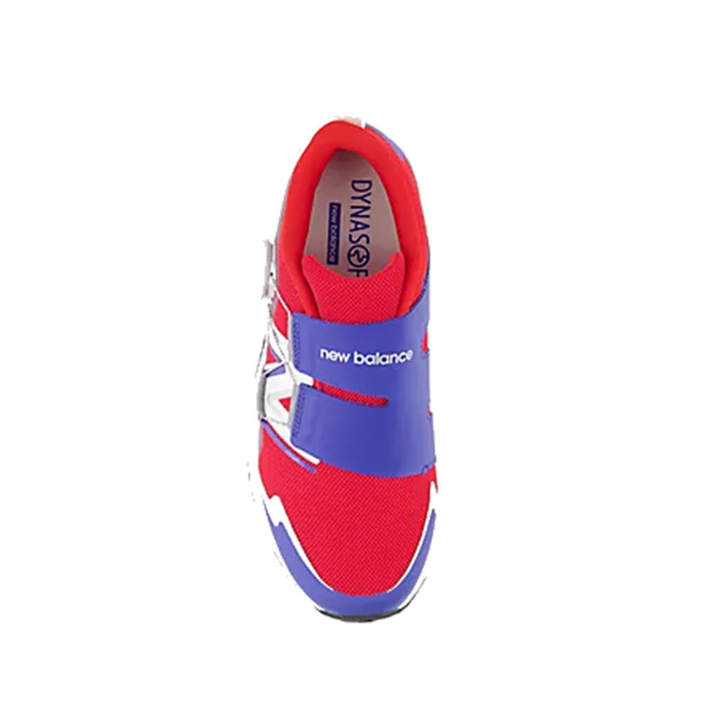 Top view of a red, white, and blue New Balance DynaSoft Reveal v4 BOA kids&#39; sneaker with the BOA® Fit System on a white background.