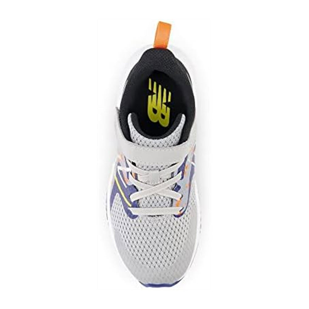 Top view of a white sneaker with purple and blue accents, featuring a black and yellow logo on the insole and an orange loop on the heel. This is the New Balance Rave Run V2 Rain Cloud - Kids.