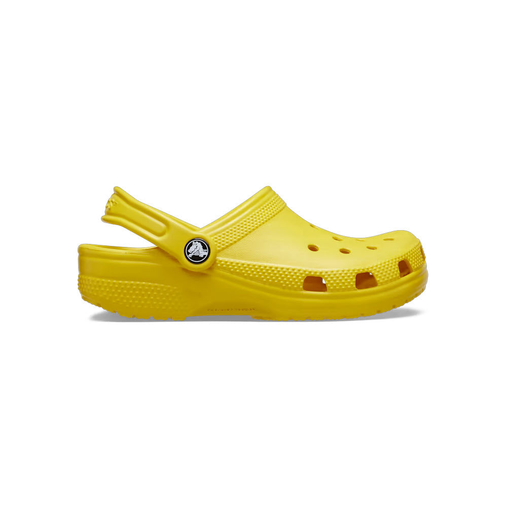A single yellow Crocs Classic Clog Sunflower - Kids displayed against a white background.