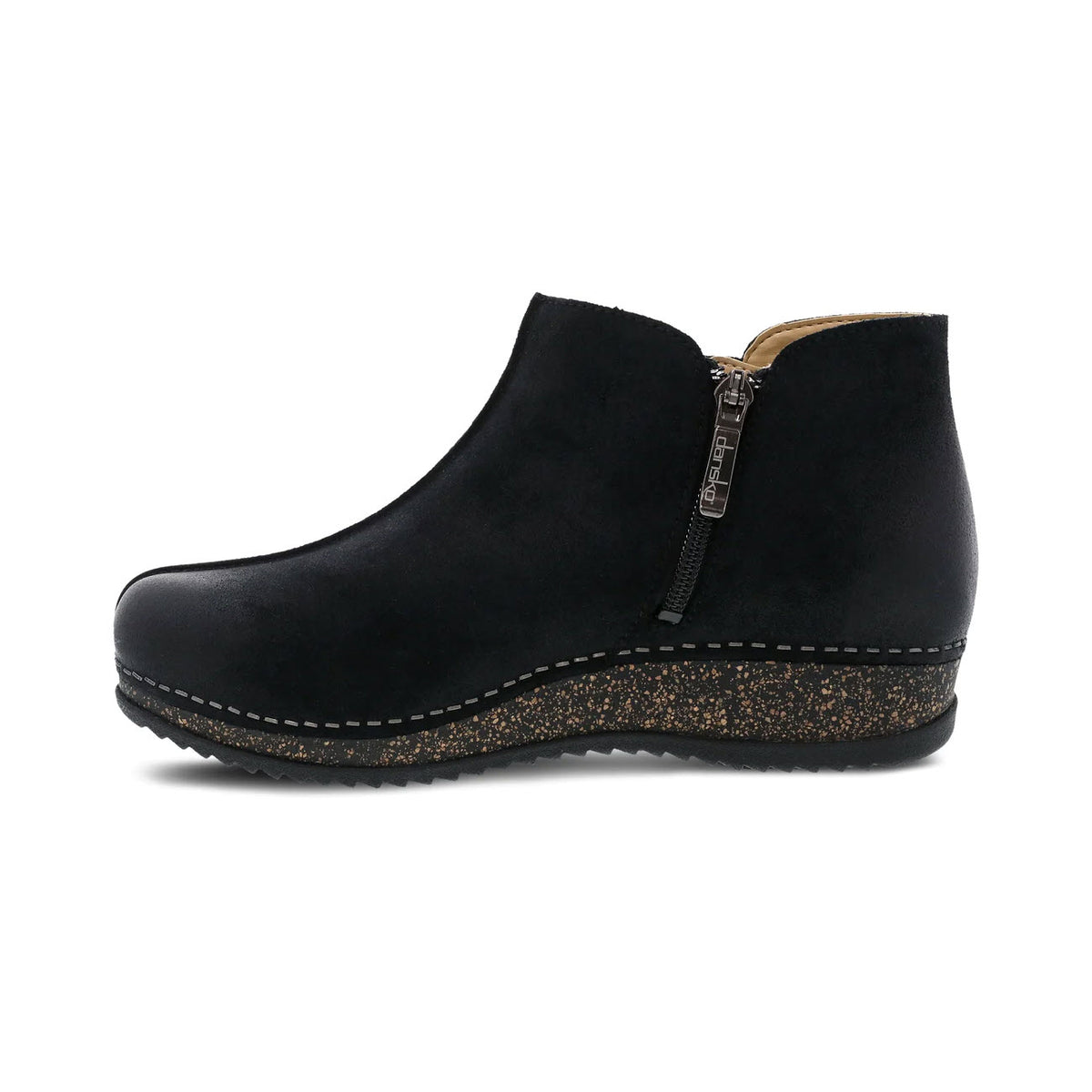Black suede Dansko Makara bootie with a side zipper and a speckled platform sole, viewed from the side on a white background.