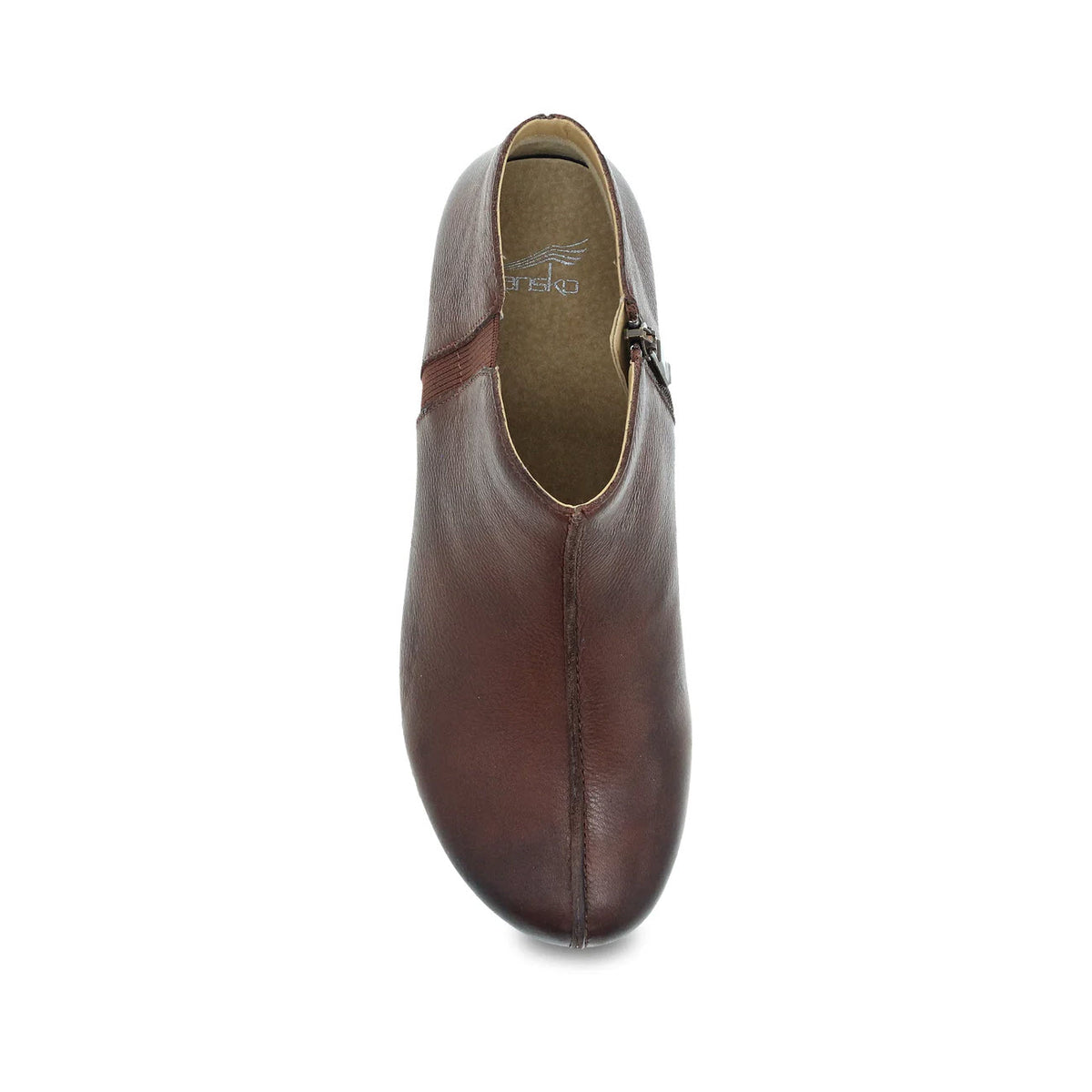 Top view of a single brown Dansko Makara bootie on a white background.