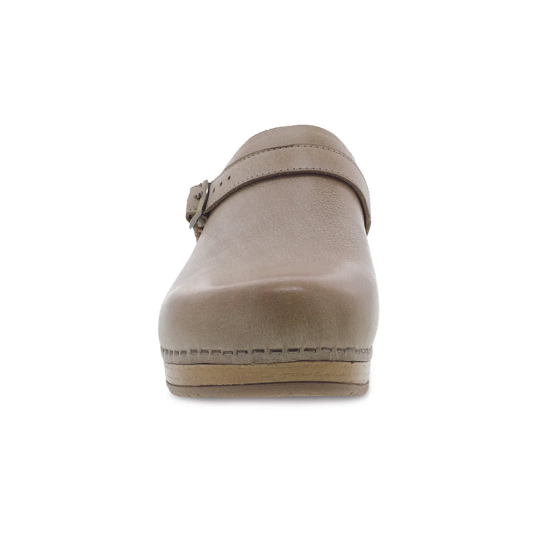 Front view of a single Dansko beige leather mule with an adjustable strap, isolated on a white background.