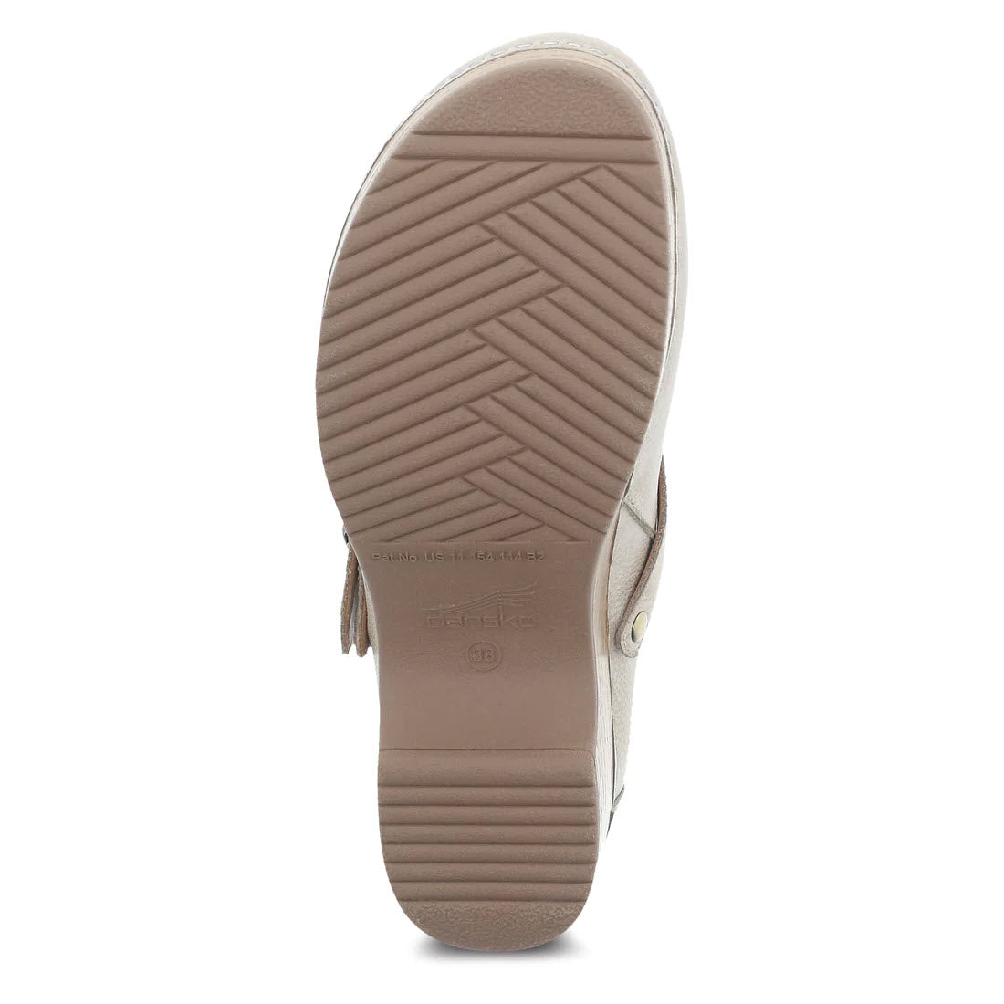 Bottom view of a Dansko tan leather mule showing a textured sole and embossed brand logo.