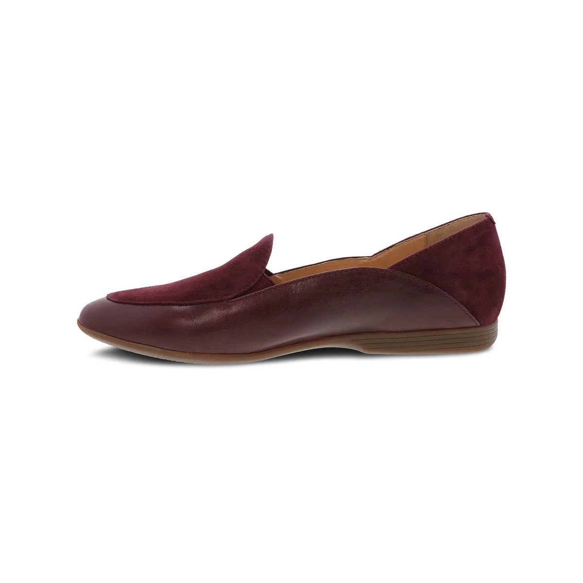 Side view of a maroon women&#39;s flat shoe featuring Dansko lace loafer design with a suede finish on a white background.