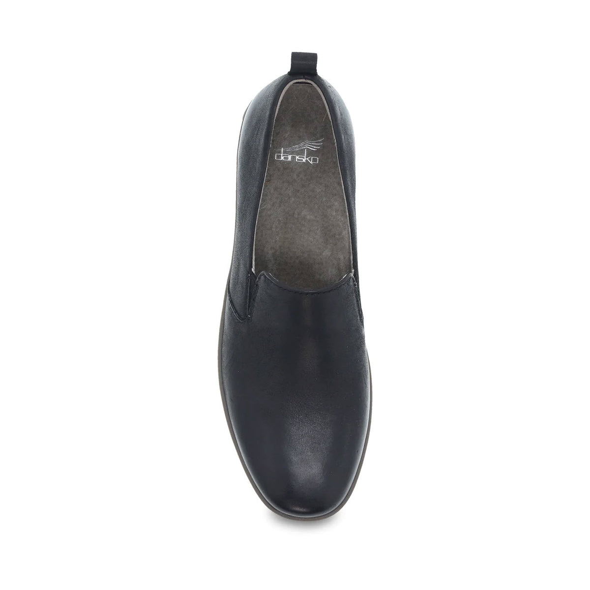 A single black Dansko Linley slip-on shoe viewed from above.