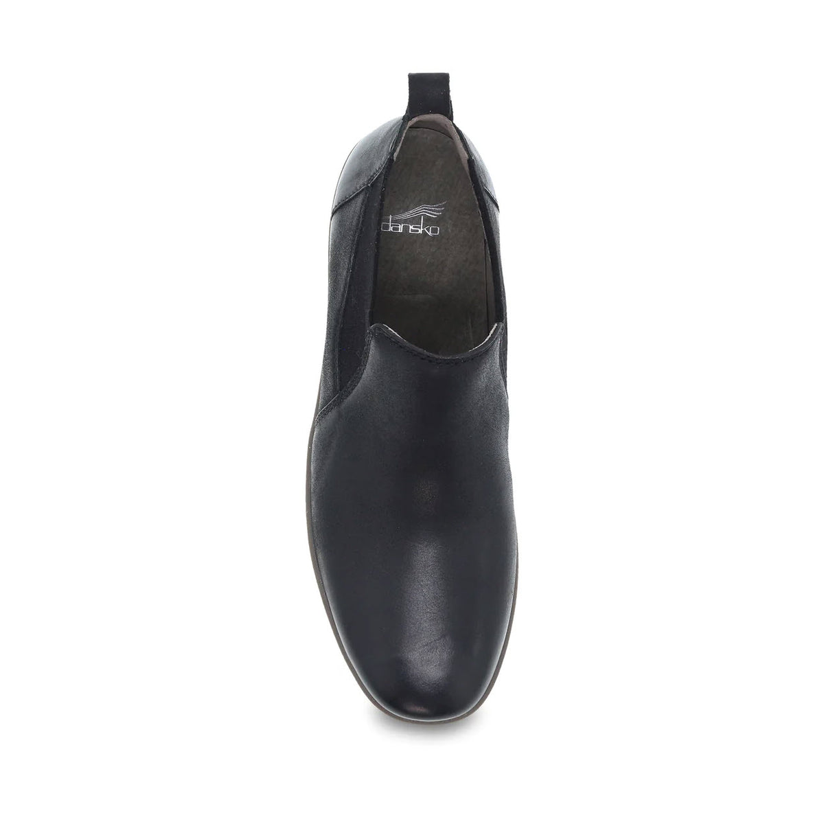 Dansko black leather low-top bootie with elastic side panels viewed from the top on a white background.
