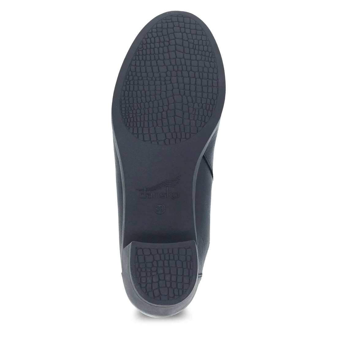 A close-up view of the sole of a Dansko Carrie Black Burnished womens backless mule with a textured pattern and embossed brand logo.