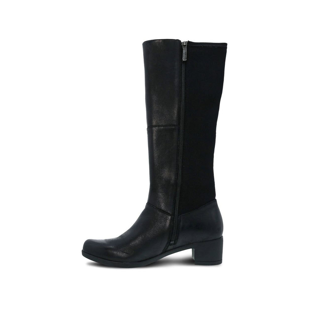 A Dansko Celestine black burnished tall shaft boot with a low, square heel and side zipper, isolated on a white background.