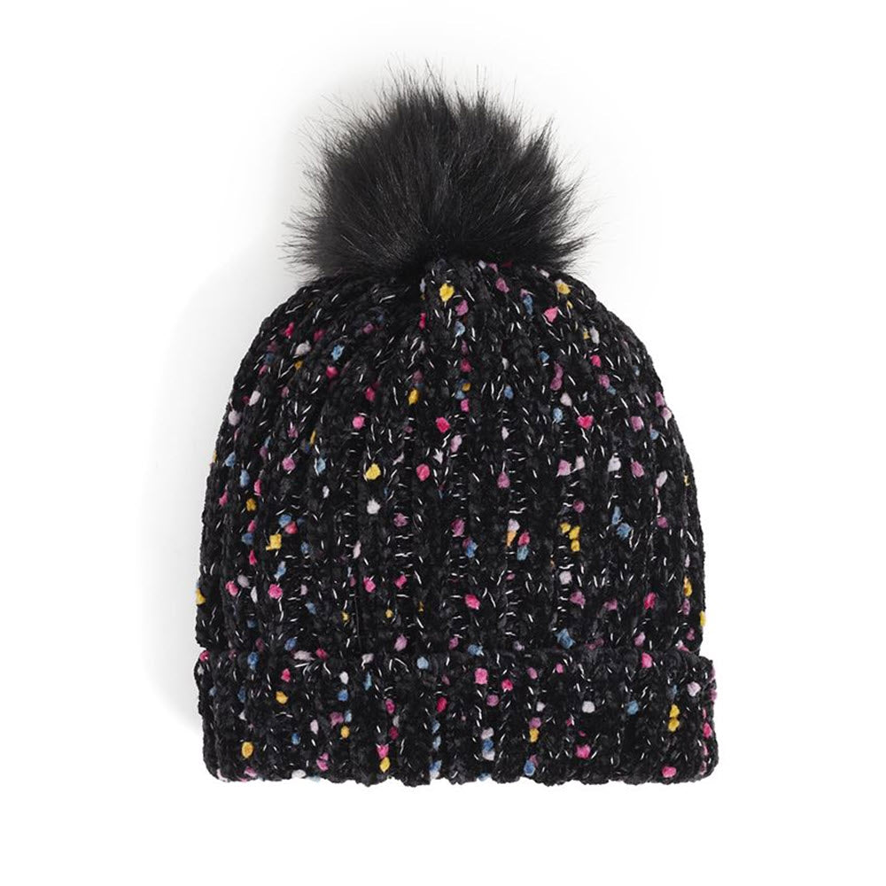 A black knitted COCO & CARMEN SPECKLED CHENILLE HAT with multicolored specks and a fluffy pom-pom on top, isolated on a white background.