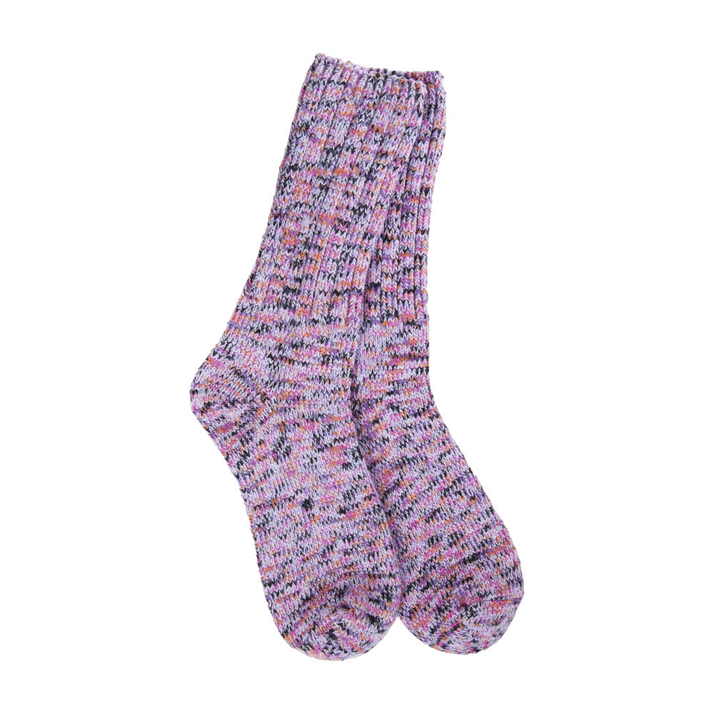 A pair of lightweight, knitted socks from the Worlds Softest Ragg Crew featuring a multicolored pink and purple speckled pattern, displayed against a white background.