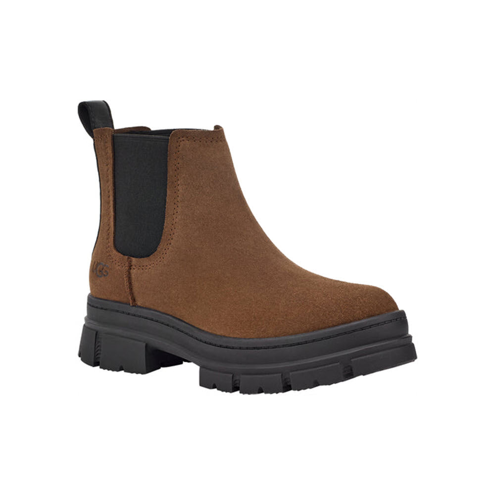 Brown waterproof leather UGG Ashton Chelsea boot with black elastic side panels and thick rubber sole, isolated on a white background.