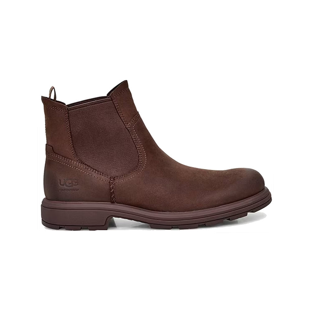 A single brown waterproof full-grain leather UGG BILTMORE Chelsea boot with elastic side panels and a pull tab, displayed against a white background.