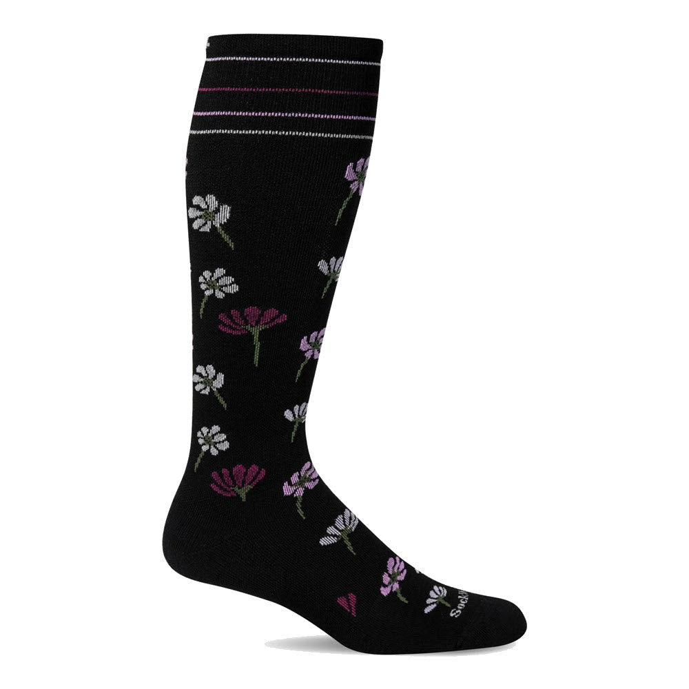 A single black knee-high Sockwell compression sock with a floral pattern featuring pink and white flowers, graduated compression, and displayed against a white background.
